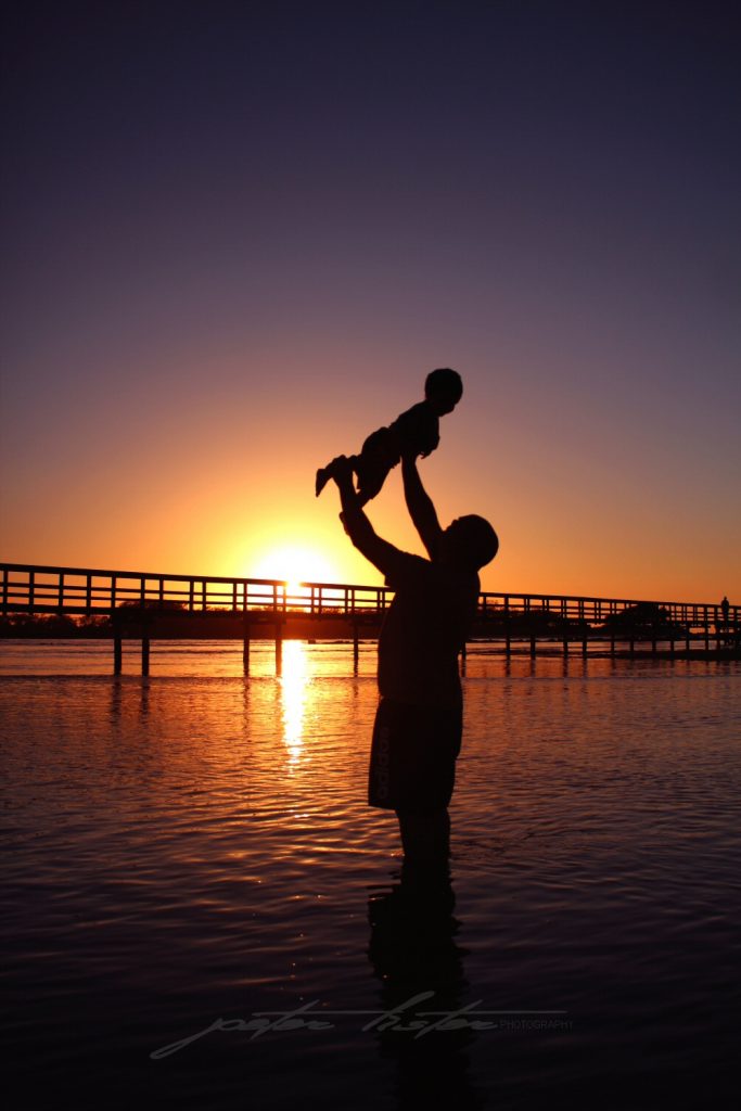 Aboriginal Father n Son Beach Sunrise Urunga NSW Australia