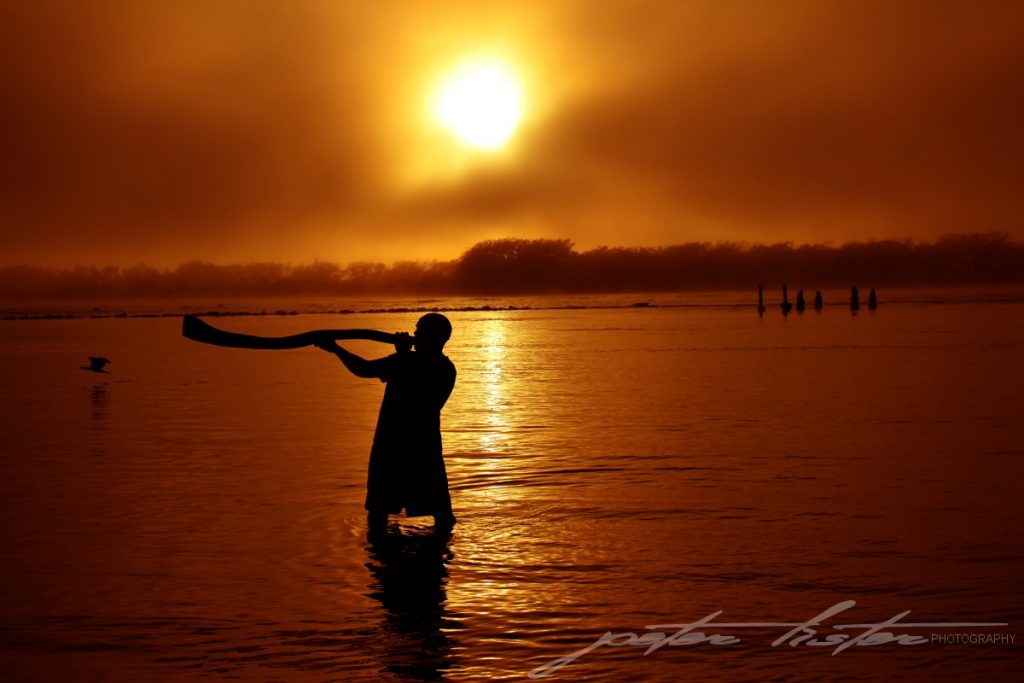 Aboriginal Playing Didgeridoo Sunrise Scene Urunga NSW Australia